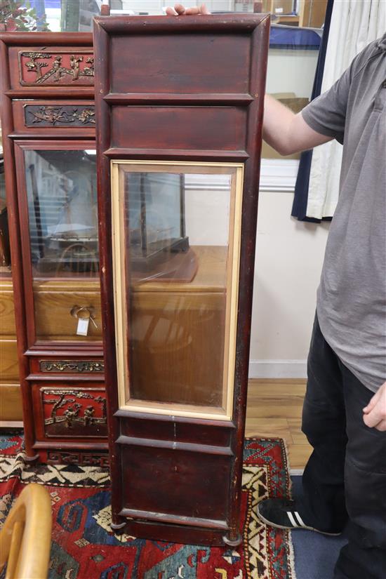 A pair of 19th century Chinese carved wood and glazed panels W.40cm